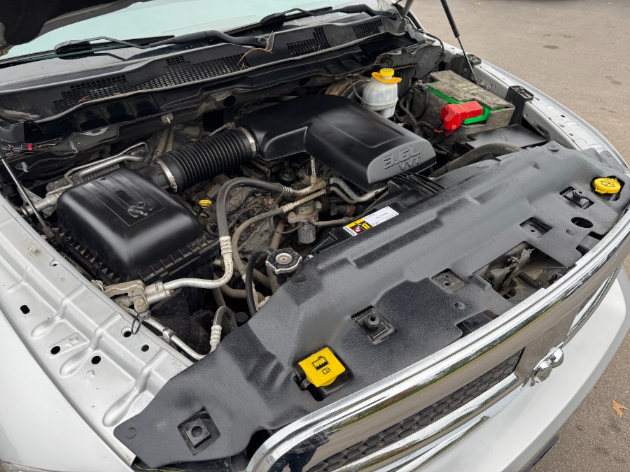 2016 Ram 1500 4WD Quad Cab 140.5" SLT, available for sale in Ortonville, Michigan | Marsh Auto Sales LLC. Ortonville, Michigan 2016 Ram 1500 4WD Quad Cab 140.5" SLT, available for sale in Ortonville, Michigan | Marsh Auto Sales LLC. Ortonville, Michigan