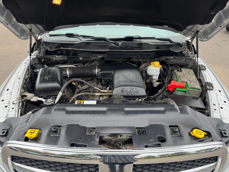 2016 Ram 1500 4WD Quad Cab 140.5" SLT, available for sale in Ortonville, Michigan | Marsh Auto Sales LLC. Ortonville, Michigan 2016 Ram 1500 4WD Quad Cab 140.5" SLT, available for sale in Ortonville, Michigan | Marsh Auto Sales LLC. Ortonville, Michigan