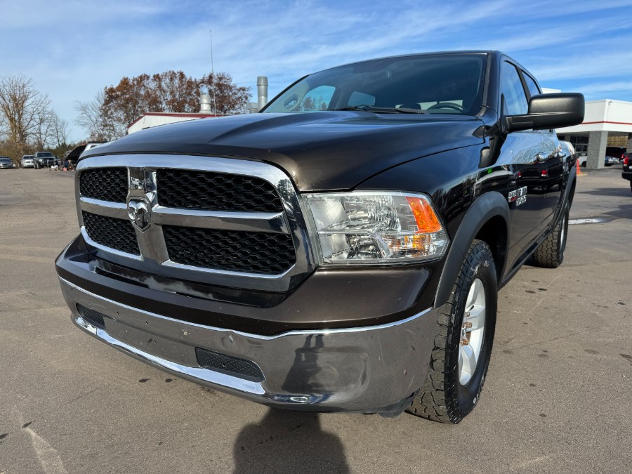 2014 Ram 1500 4WD Crew Cab 140.5" SLT, available for sale in Ortonville, Michigan | Marsh Auto Sales LLC. Ortonville, Michigan