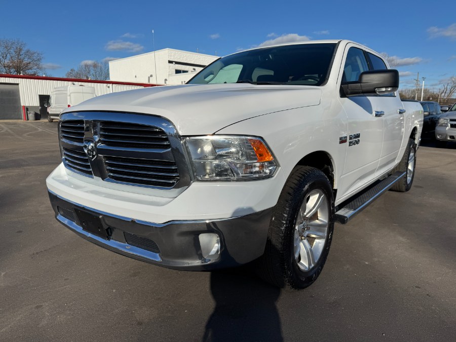 2017 Ram 1500 4WD Crew Cab 140.5" SLT, available for sale in Ortonville, Michigan | Marsh Auto Sales LLC. Ortonville, Michigan