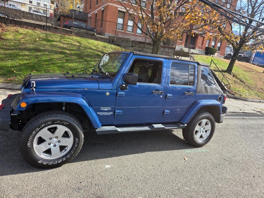 2010 Jeep Wrangler Unlimited 4WD 4dr Sahara, available for sale in Derby, Connecticut | Bridge Motors LLC. Derby, Connecticut