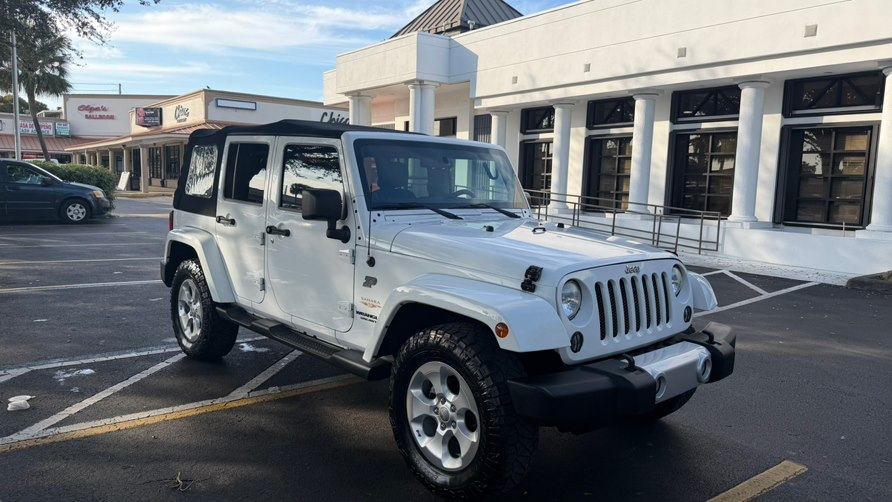 Used 2014 Jeep Wrangler Unlimited sahara in Hialeah, Florida | The Palm Motors LLC. Hialeah, Florida