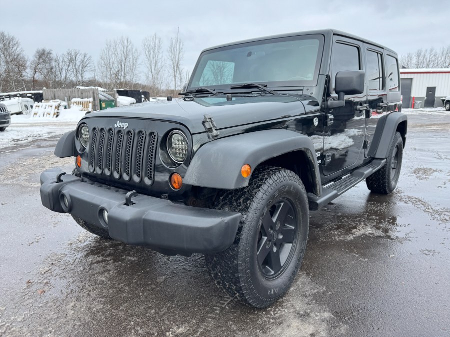 2012 Jeep Wrangler Unlimited 4WD 4dr Sport, available for sale in Ortonville, Michigan | Marsh Auto Sales LLC. Ortonville, Michigan