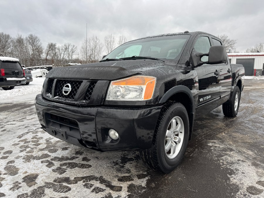 2012 Nissan Titan 4WD Crew Cab SWB SV, available for sale in Ortonville, Michigan | Marsh Auto Sales LLC. Ortonville, Michigan