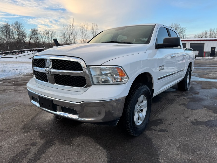2016 Ram 1500 4WD Crew Cab 140.5" SLT, available for sale in Ortonville, Michigan | Marsh Auto Sales LLC. Ortonville, Michigan
