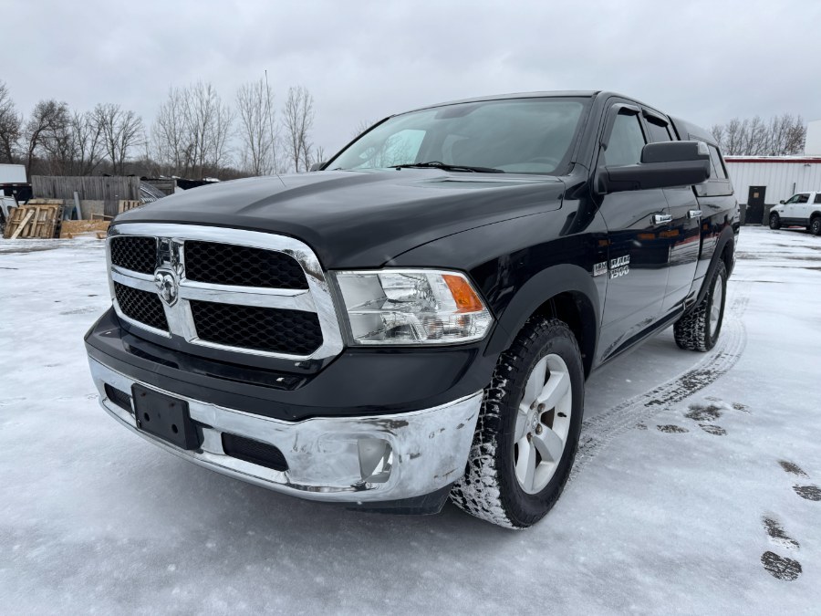 2013 Ram 1500 4WD Quad Cab 140.5" SLT, available for sale in Ortonville, Michigan | Marsh Auto Sales LLC. Ortonville, Michigan