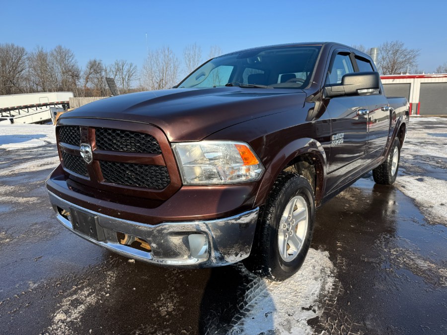 2014 Ram 1500 4WD Crew Cab 140.5" Outdoorsman, available for sale in Ortonville, Michigan | Marsh Auto Sales LLC. Ortonville, Michigan