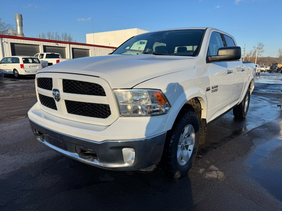 2014 Ram 1500 4WD Crew Cab 140.5" Outdoorsman, available for sale in Ortonville, Michigan | Marsh Auto Sales LLC. Ortonville, Michigan