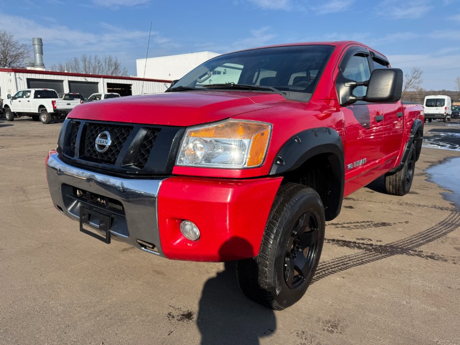 2012 Nissan Titan 4WD Crew Cab SWB SV, available for sale in Ortonville, Michigan | Marsh Auto Sales LLC. Ortonville, Michigan