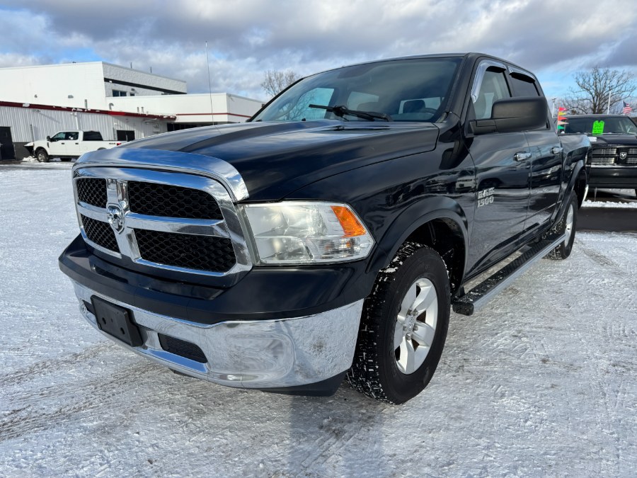 2015 Ram 1500 4WD Crew Cab 140.5" SLT, available for sale in Ortonville, Michigan | Marsh Auto Sales LLC. Ortonville, Michigan
