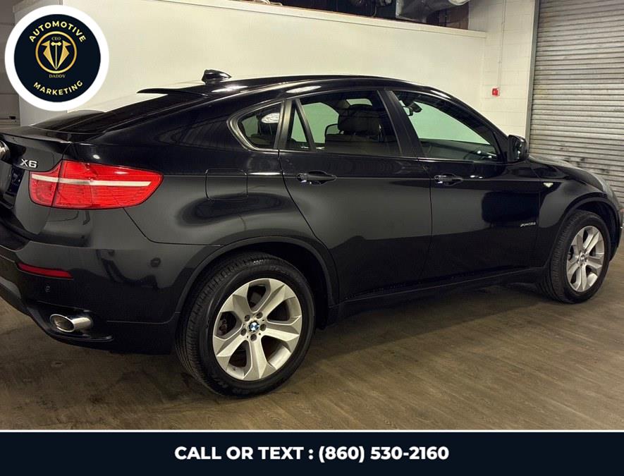 2011 BMW X6 xDrive35i's photo