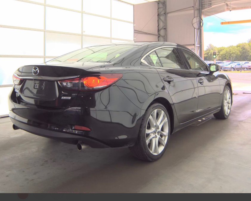 2014 Mazda EZ-6 i Touring's photo